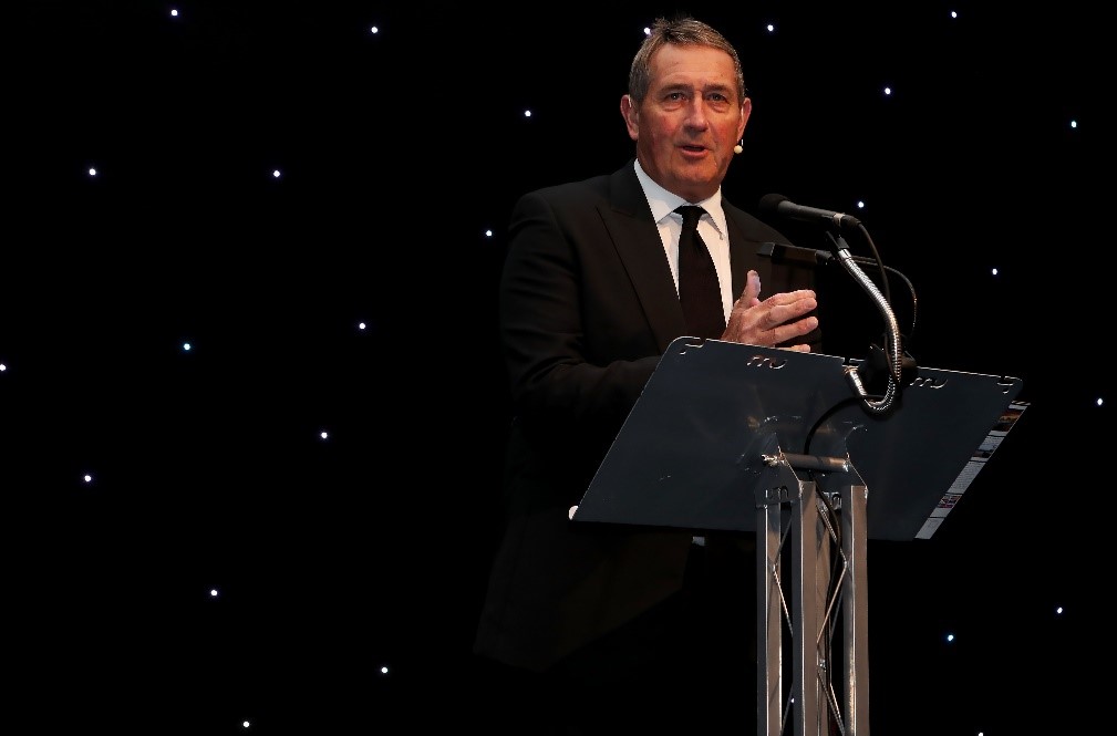 Graham Gooch making the donation.