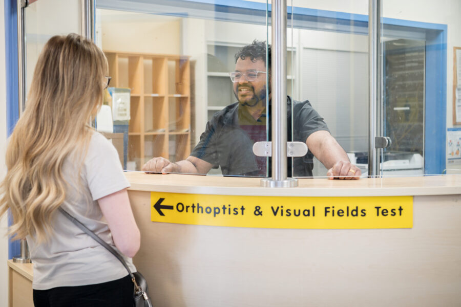 outpatient and hospital worker at the Ophthalmology outpatient department desk