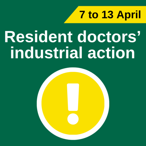 Green background poster announcing “Resident doctors’ industrial action,” with the dates “7 to 13 April” in a yellow banner at the top. A large yellow warning symbol with an exclamation mark appears below the text.